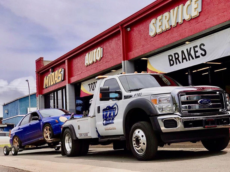 Truck towing a car